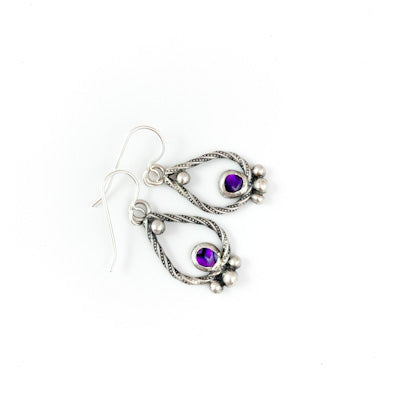 Mandana Studios sterling silver earrings twisted with purple abalone shell stone