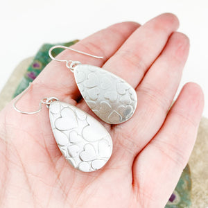 Mandana Studios cute sterling silver earrings with heart texture