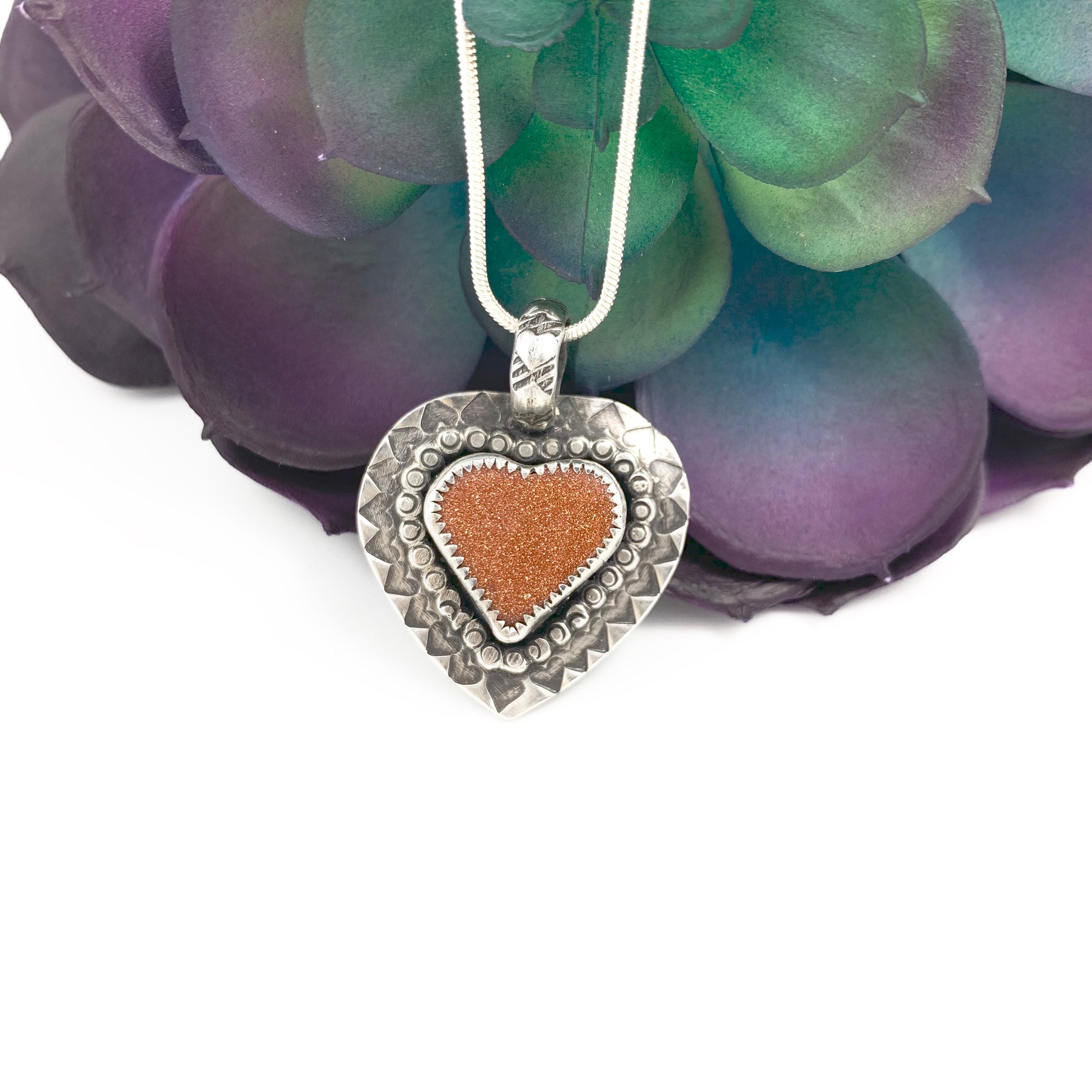 Mandana Studios goldstone heart set in sterling silver pendant