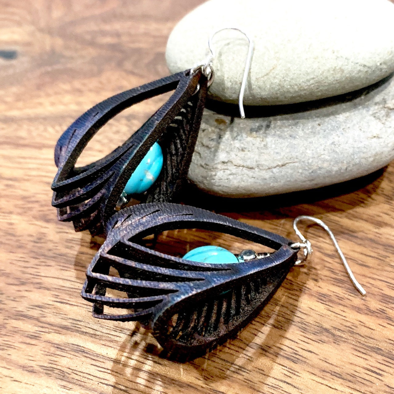 black leather cage earrings with howlite stone side view